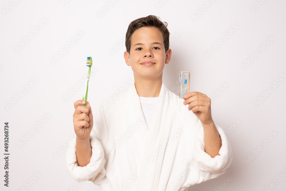 Young Boy brushing teeth isolated on white background. Young Boy brushing teeth isolated on white background.