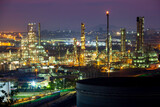 Morning sun orange scene of oil refinery plant and tower column oil of Petrochemistry mountain