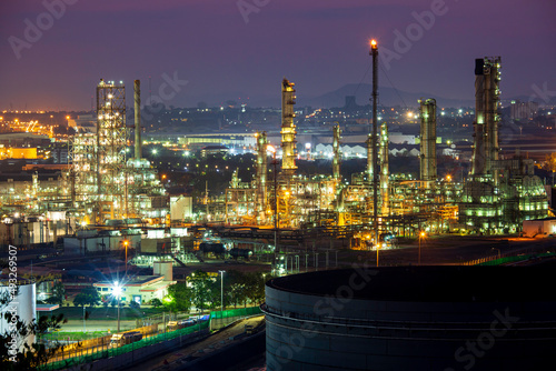 Morning sun orange scene of oil refinery plant and tower column oil of Petrochemistry mountain