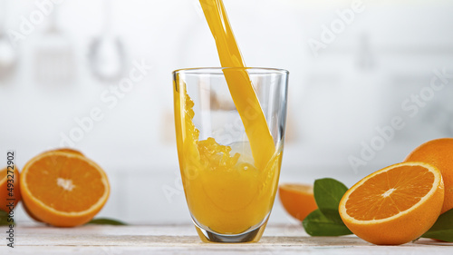 Fresh Orange Juice Being Po...