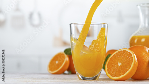 Fresh Orange Juice Being Po...