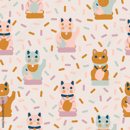 Fototapeta Naklejka Na Ścianę i Meble -  Maneki Neko japanese vintage cat toy seamless pattern. Vector illustration