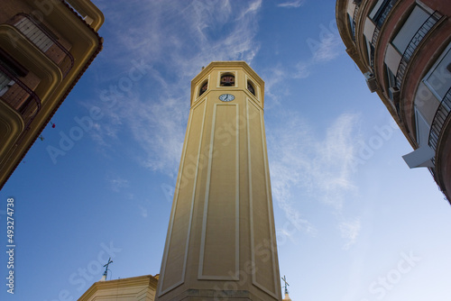 Bell tower of Parish of Our Lady of Grace at Plaza de la Montaneta in Alicante, Spain photo