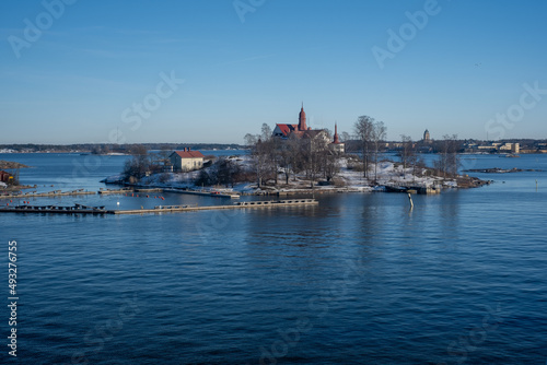 A view from the south harbor towards the sea. An old mansion in the middle of Helsinki.