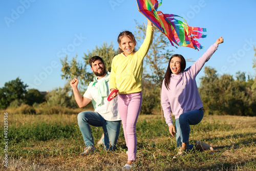 Cute little girl with kite ...