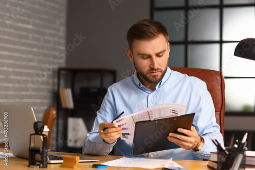 Male notary public working ...