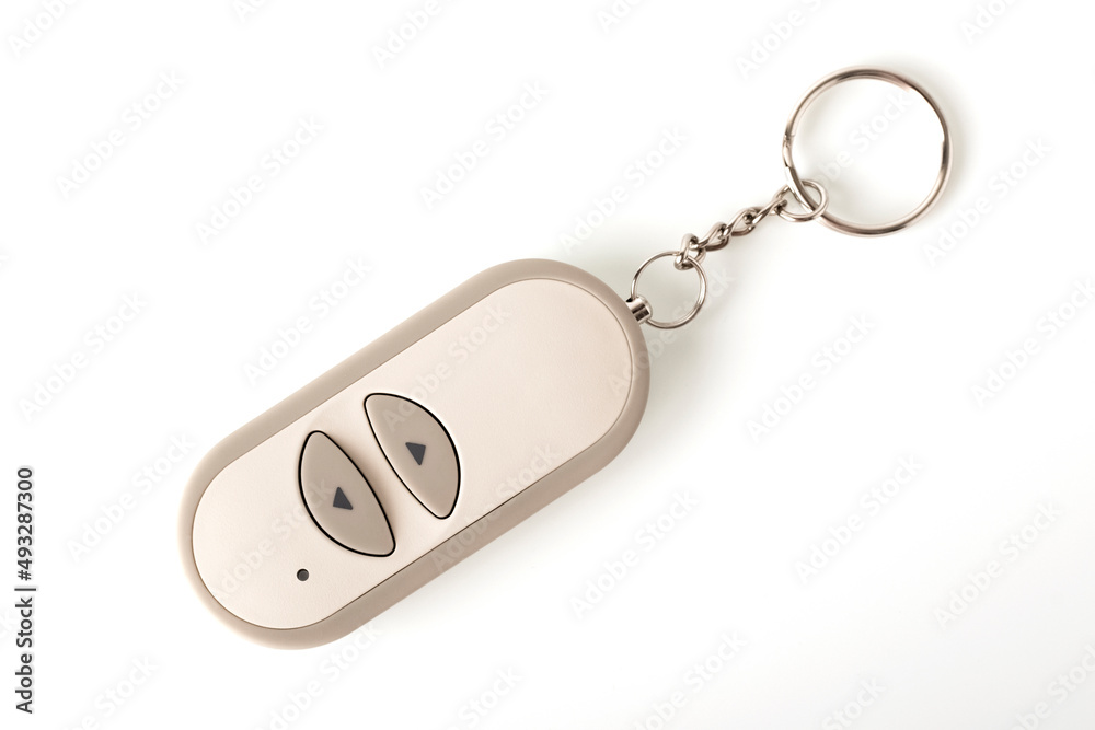 Infrared remote control or keychain for remote control. Isolated object on white background