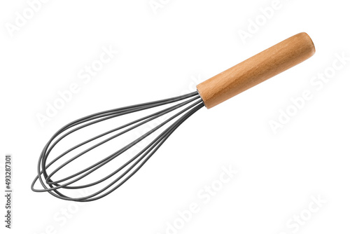 Kitchen whisk with wooden handle on a white background. Kitchen tool concept. isolated object