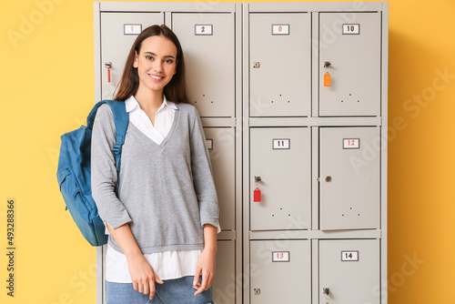 Female student near locker ...