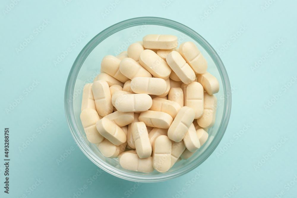 Vitamin C, vitamin on a colored background, vitamins for health