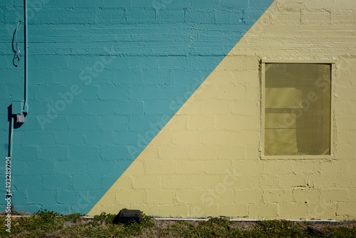Greenish blue and yellow painted wall