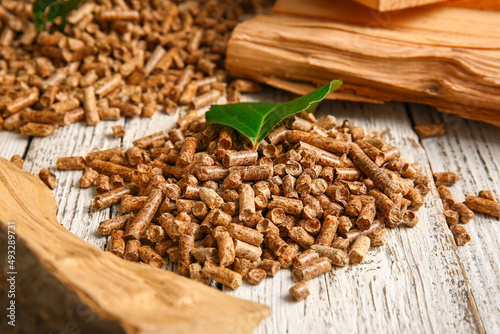 Pile of wood pellets on lig...