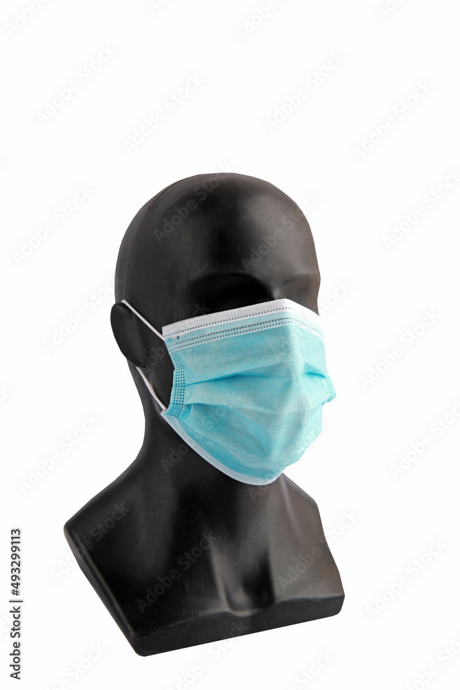 Protective face mask from coronavirus on the face of a mannequin.