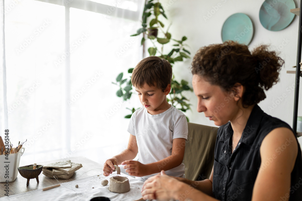 Child Learning How To Work With Clay Child Learning How To Work With Clay