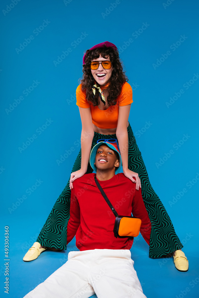 © BONNINSTUDIO/Stocksy - Fashionable joyful diverse models in studio © BONNINSTUDIO/Stocksy - Fashionable joyful diverse models in studio