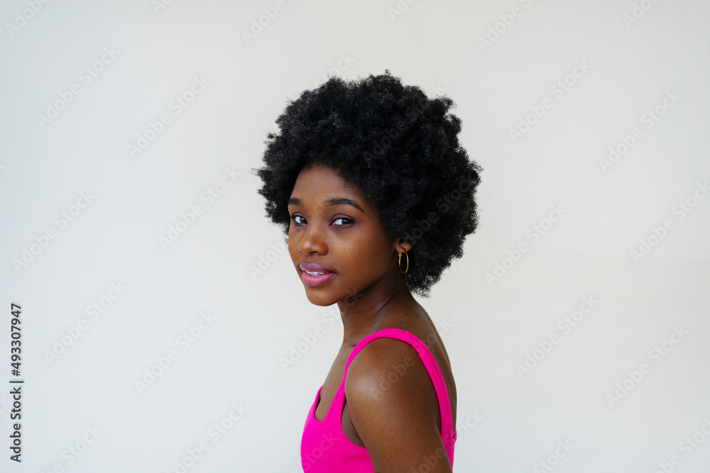 Stylish black lady looking at camera