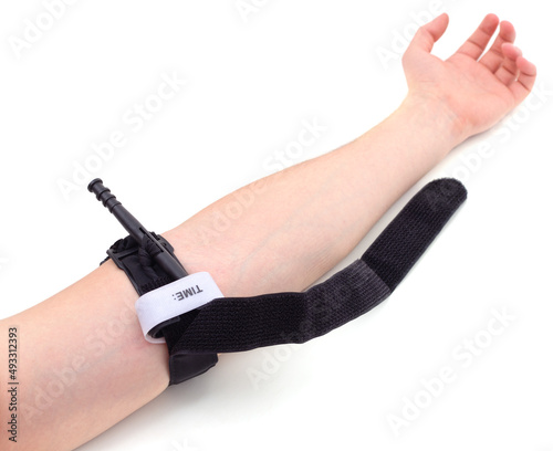 Fotografía Hemostatic tourniquet imposed on hand.