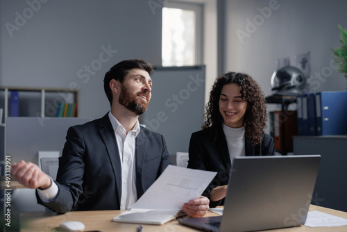 Happy coworkers working together in trade company