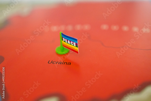 europe map detailing the ukraine area with peace flag in the center. no war, peace, love. photo