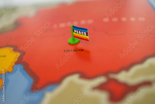 europe map detailing the ukraine area with peace flag in the center. no war, peace, love. photo