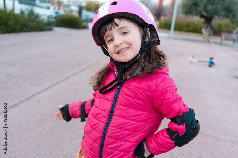Happy little skater girl portrait Happy little skater girl portrait