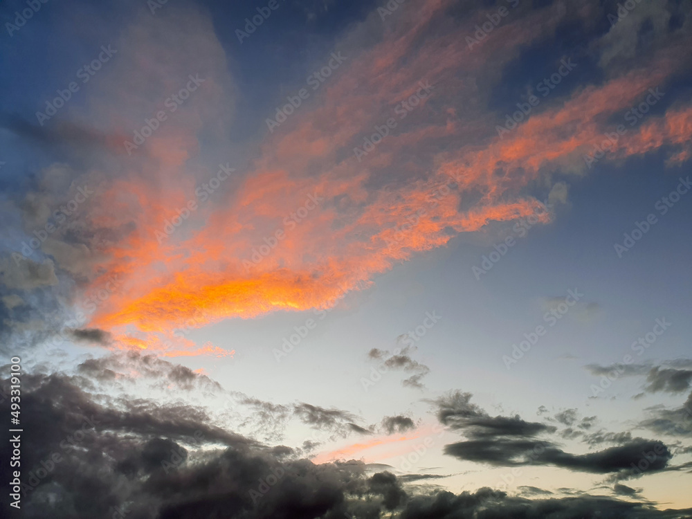 A scenic and dramatic cloudy sunset sky