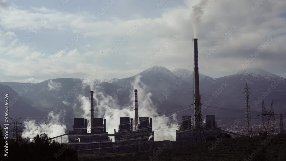 Thermal power plant or coal power plant and cooling tower with steam. Electricity generation Thermal power plant or coal power plant and cooling tower with steam. Electricity generation