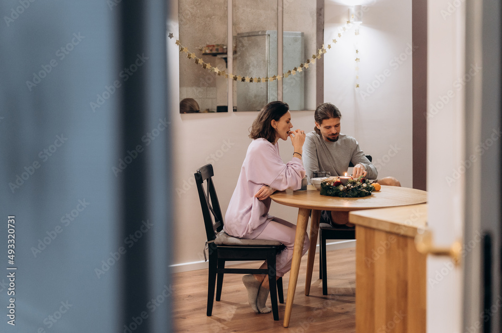 Couple having teatime at table Couple having teatime at table