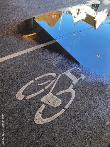 bicycle lane on asphalt road photo