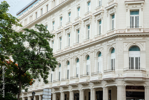 Wallpaper Mural White building on diagonal perspective and a tree Torontodigital.ca