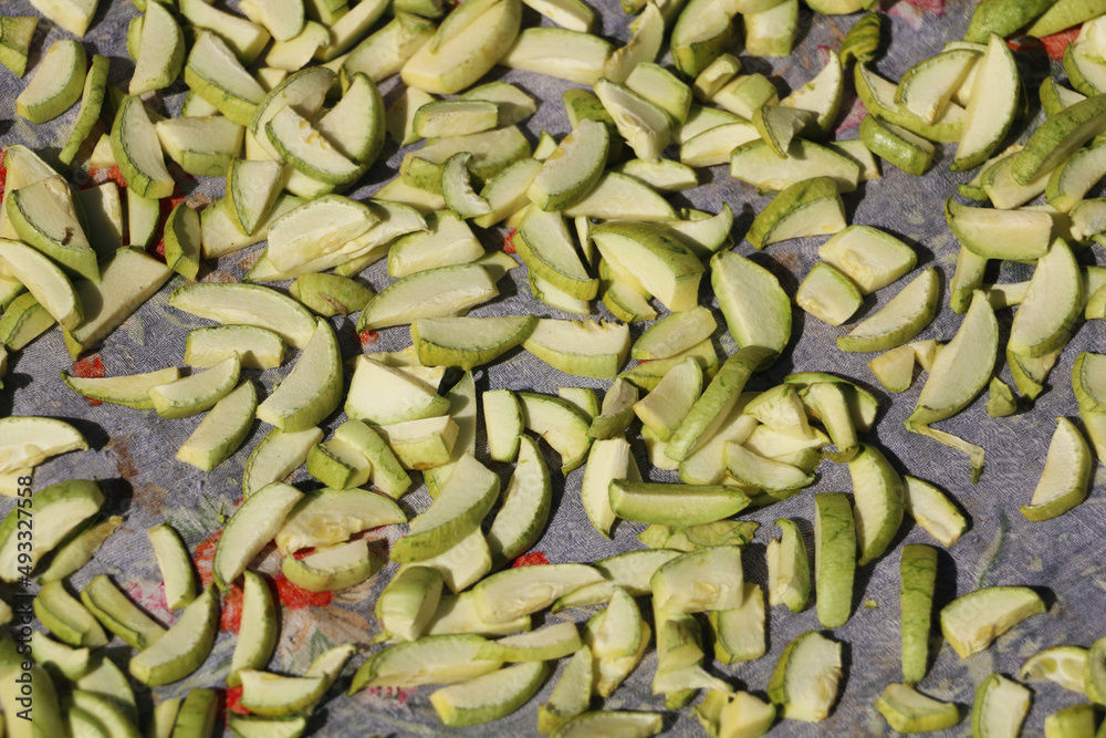 Turkey: Naturally dried Amasya apple under the sun in the garden of a village house in Amasya Turkey: Naturally dried Amasya apple under the sun in the garden of a village house in Amasya