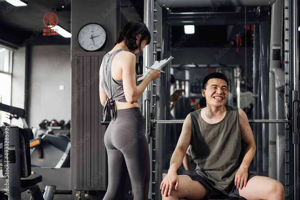 Young Asian couple exercising Young Asian couple exercising