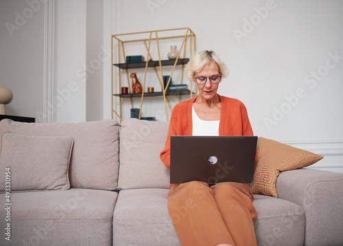 Senior woman spending time at home photo