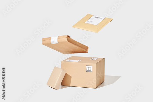 Parcels falling down on box photo