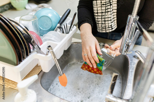 Female Hands Doing Dishes photo