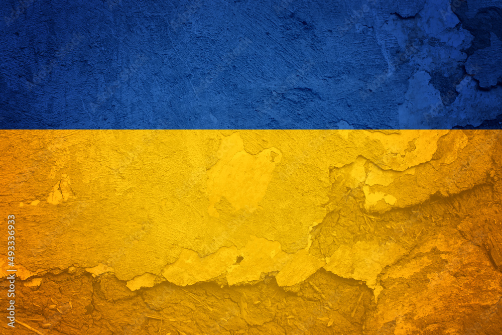 National Ukrainian flag with cracked background. Wallpaper with cracks. Ukraine.