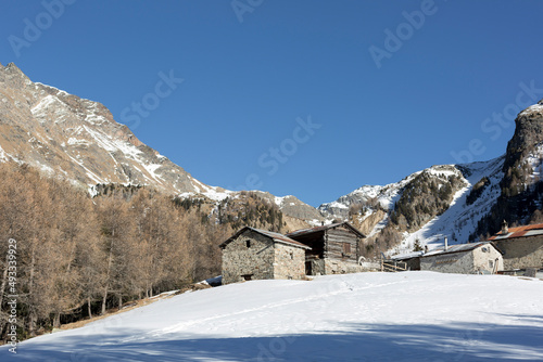 Houses mountain landscape with snow photo