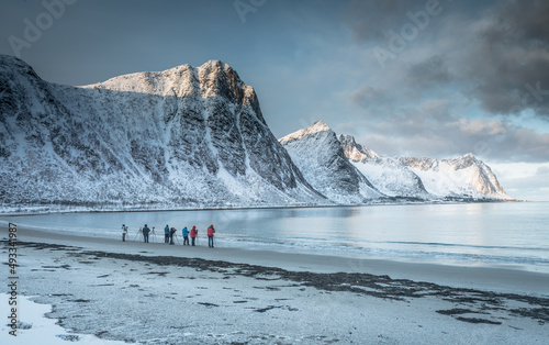 Photgraphers lining the shore.  Senja.  Norway photo