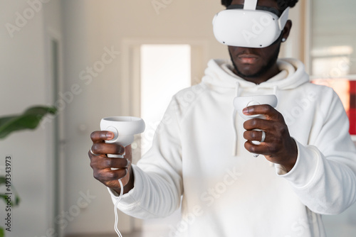 Black Man Using Virtual Reality Glasses  photo