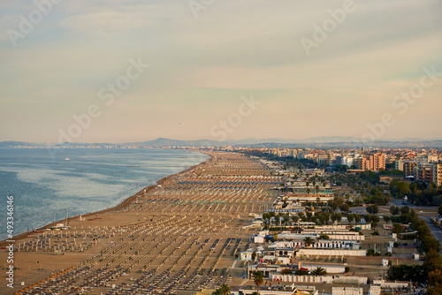 Wallpaper Mural Aerial view of Rimini beach with people and blue water. Torontodigital.ca