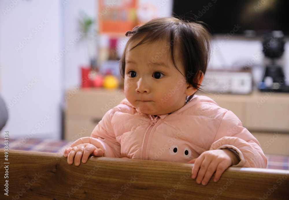 Cute asian little girl entertaining time at home Cute asian little girl entertaining time at home