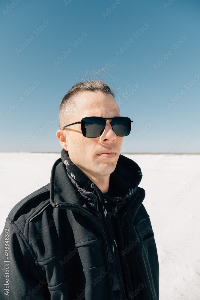 Modern Casual Portrait of a Man in Sunglasses Modern Casual Portrait of a Man in Sunglasses
