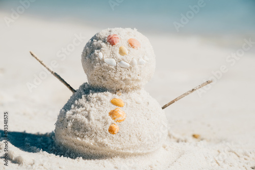 Happy Snowman Built with Beach Sand 