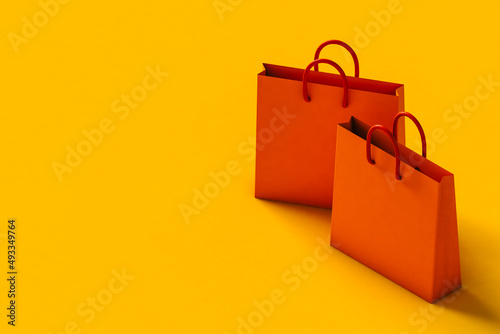 Orange shopping bag with large concept.