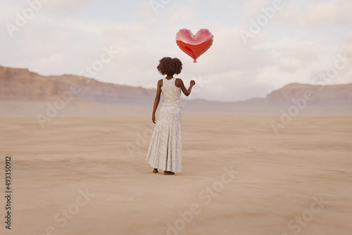 Valentine balloon held by woman