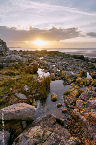 Heysham sunset at low tide. photo