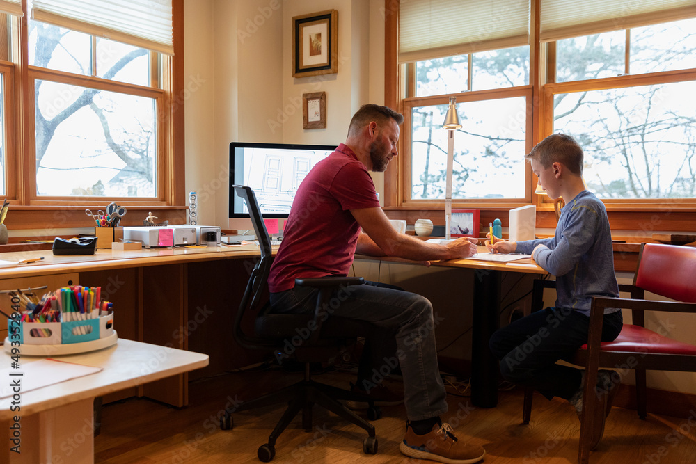 Father Working from Home office with doing homeschool Father Working from Home office with doing homeschool