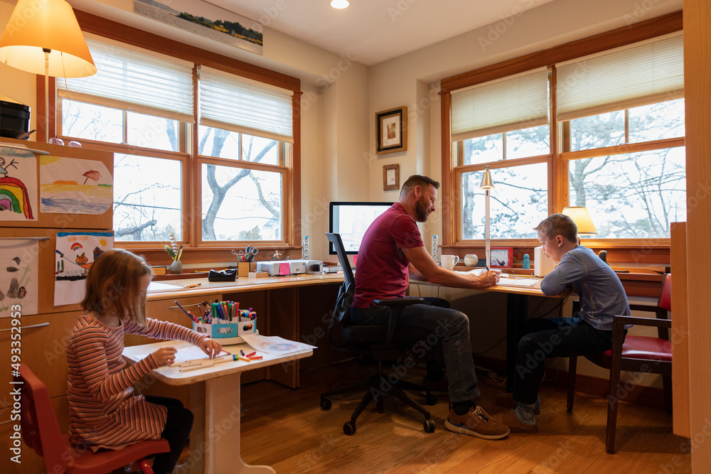 Bonding together at home office with homework Bonding together at home office with homework