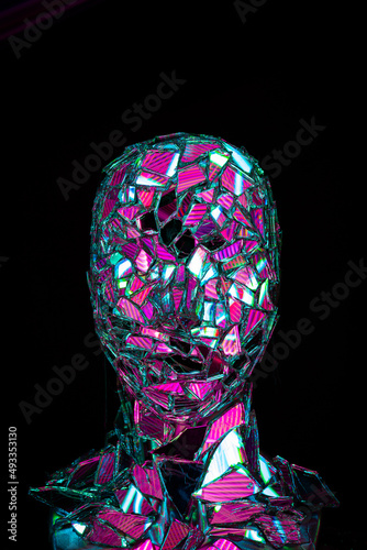Futuristic robot face. Technology and future concept. on a dark background.