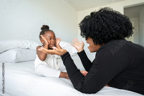 A family play peek a boo